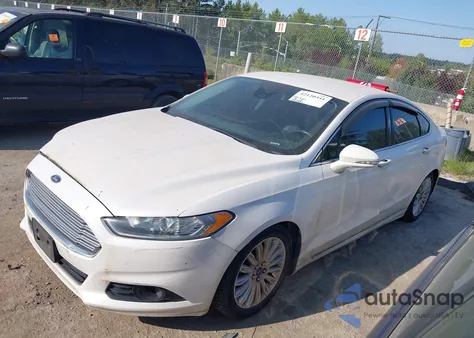 2016 Ford Fusion Hybrid Titanium from USA, damaged, VIN 3FA6P0RU2GR357739